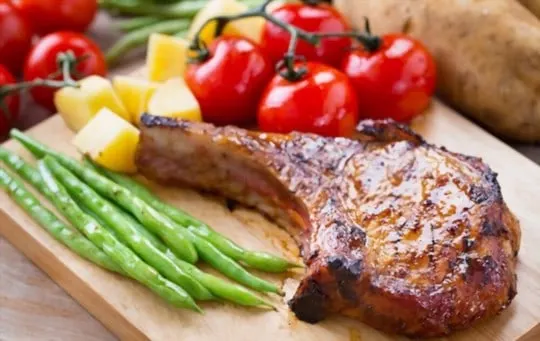 grilled pork chops with red barbeque sauce